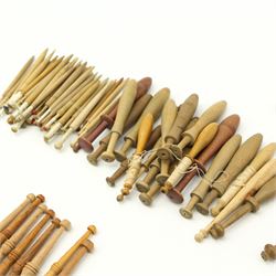 Collection of lace maker's bobbins to include ornate coloured glass examples, eight Maltese wooden bobbins, twenty brass bobbins with turned and textured shafts, together with various wooden examples, some with ornate glass beaded weights/ spangles 