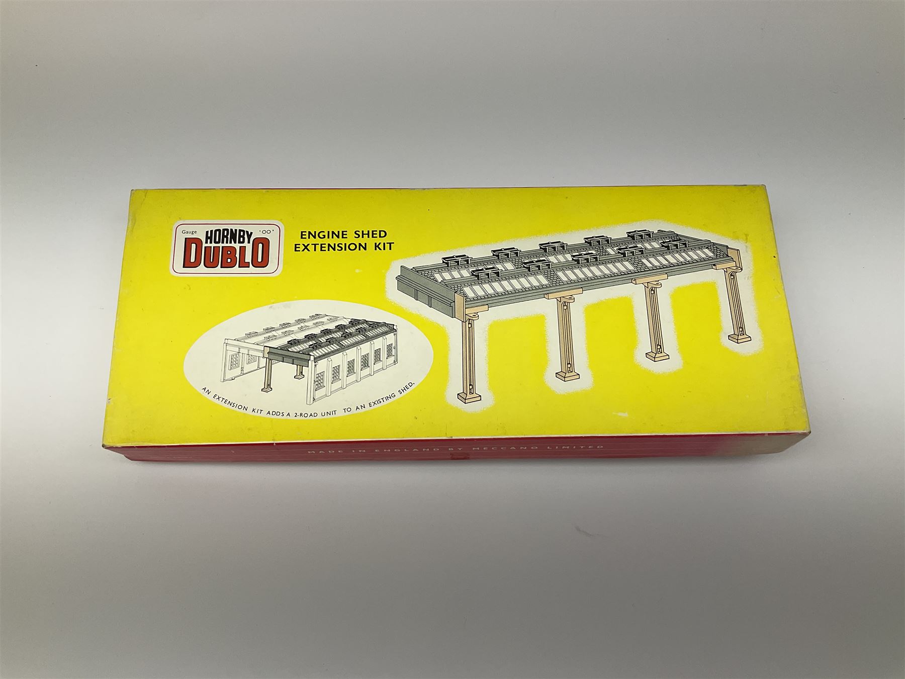 Hornby Dublo - 5006 Engine Shed Extension Kit; 5085 Suburban Station Kit with instructions; and 5030 Island Platform Kit; all in pictorial boxes; and Goods Depot Moulded Kit in box base only (4)