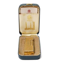 Dunhill gold-plated lighter, with textured case, boxed