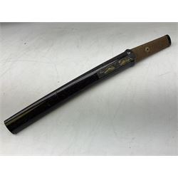 Japanese Tanto with 28.5cm steel blade and cord bound grip; in red spotted black lacquer saya containing a kogai knife with etched characters to the blade and ornate fern leaf and snake handle