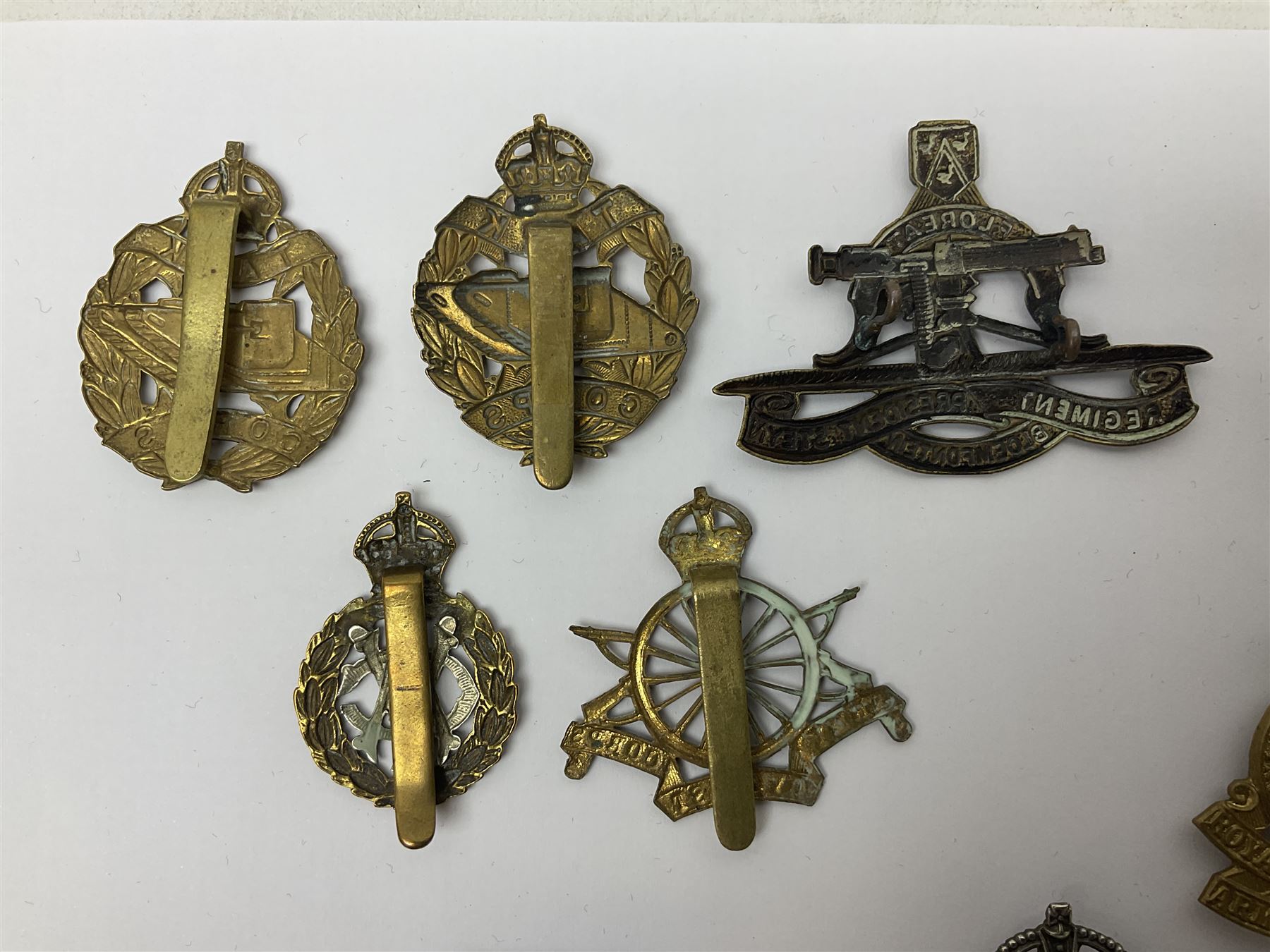 Seventeen cap badges including Expeditionary Forces Canteen, Machine Gun Corps, Tank Regiment, Jewish Battalions, Ordnance Corps, Medical Corps, Cyclist Corps, RFC & RAF, Veterinary Corps, Drake battalion etc (17)