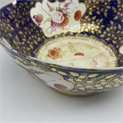 19th century continental bowl, decorated with hand painted floral sprays amongst gilt foliate decoration on a cobalt blue ground, D27.5cm