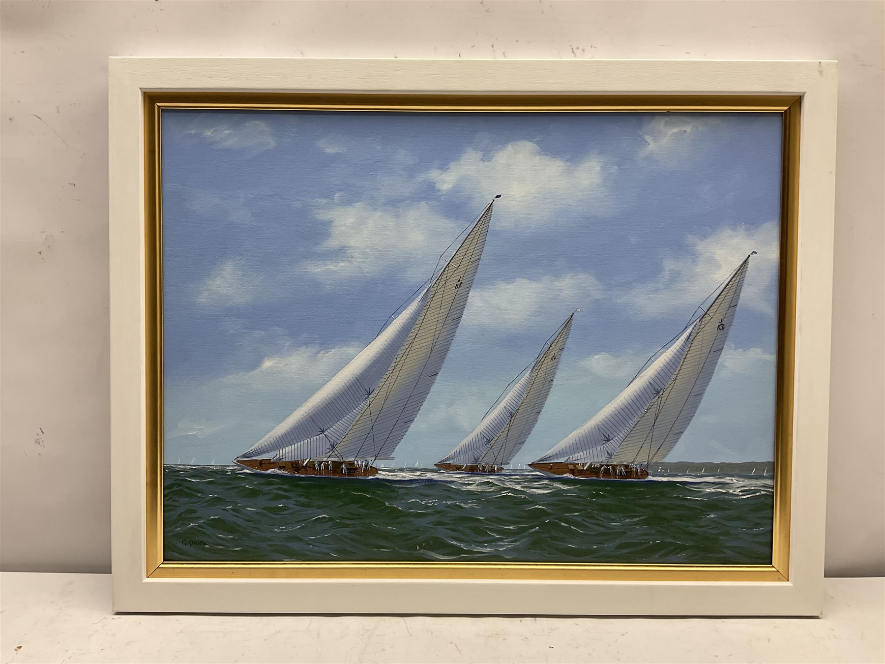 George Drury (British 1950-): J Class Yachts 'Velsheda' 'Endeavour' and 'Shamrock V 1935', oil on canvas board signed, titled verso 42cm x 57cm