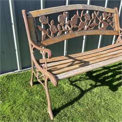 Cast iron an wood slat bench with rose design back rest  - THIS LOT IS TO BE COLLECTED BY APPOINTMENT FROM DUGGLEBY STORAGE, GREAT HILL, EASTFIELD, SCARBOROUGH, YO11 3TX