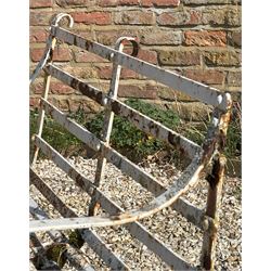 19th century riveted strapwork iron two seat garden bench with scrolled arms and supports. H83cm, L101cm, D70cm.  - COLLECTION BY APPOINTMENT FROM: The White House, Thirsk Road, Easingwold, York, YO61 3NF - CALL 01723 507111 TO ARRANGE