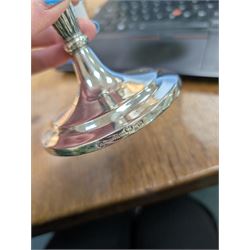 Pair of continental silver candlesticks, probably German Hanau, each of tapering form, with fern leaf decoration, upon a stepped circular base, with Hanau marks and assay scrape to base, H19cm