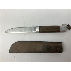 Burmese dha dagger with 15cm steel blade, white metal ferrule and horn handle, in white metal and filigree scabbard L30.5cm; a Burmese long bladed knife with horn handle and brass mounted teak scabbard; and another Eastern dagger in sheath (3)