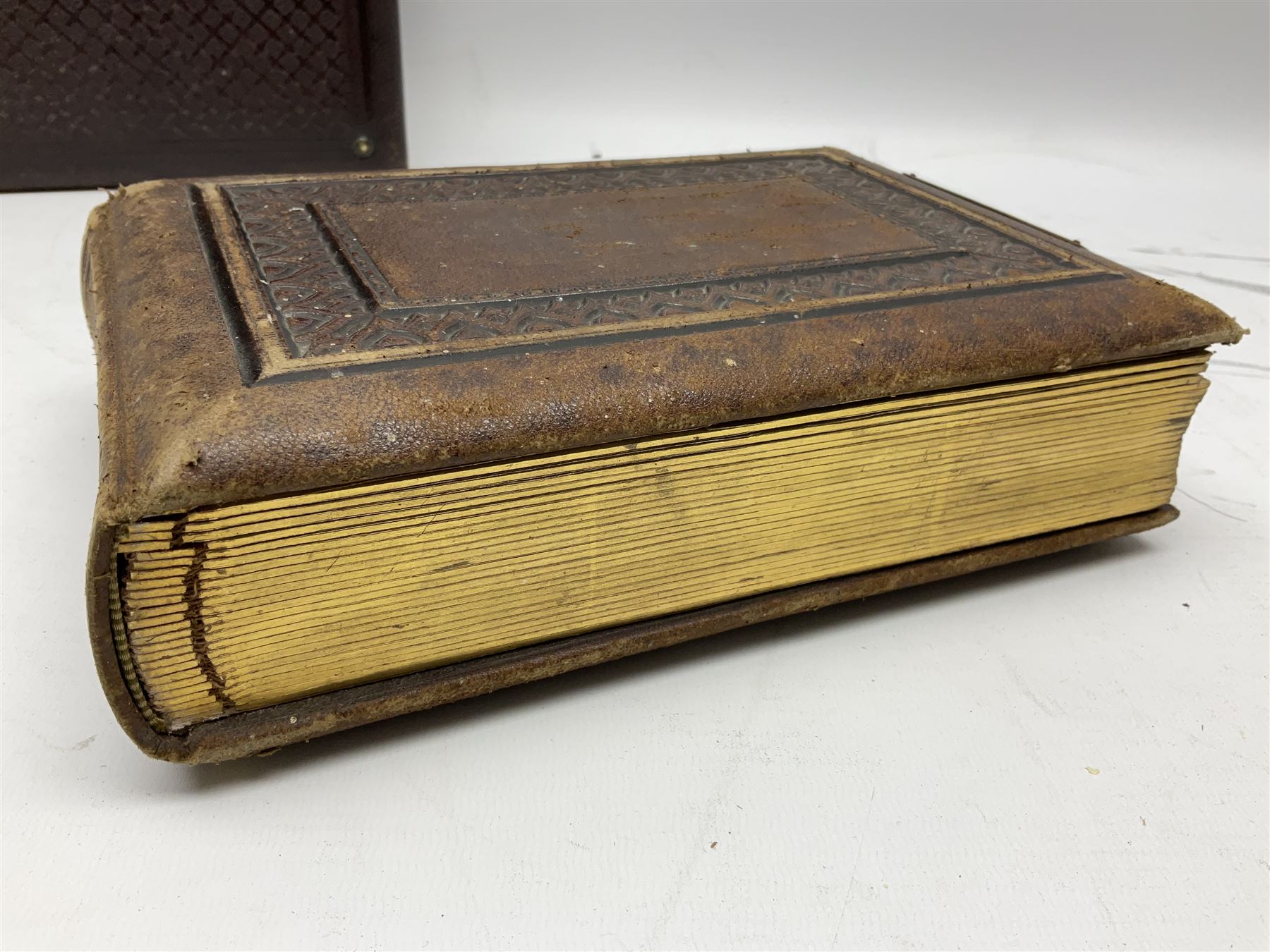 Victorian leather bound musical photo album, together with another victorian photo album, with photographs 