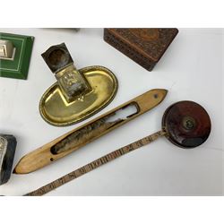 Olive wood lidded urn/vase, brass inkwell, Art Deco style perpetual desk calendar, leather bound Chesterman tape measure, brass roasting spit, Punch Magazines etc