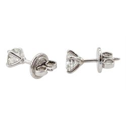 Pair of 18ct white gold round brilliant cut diamond stud earrings, total diamond weight approx 1.10 carat
