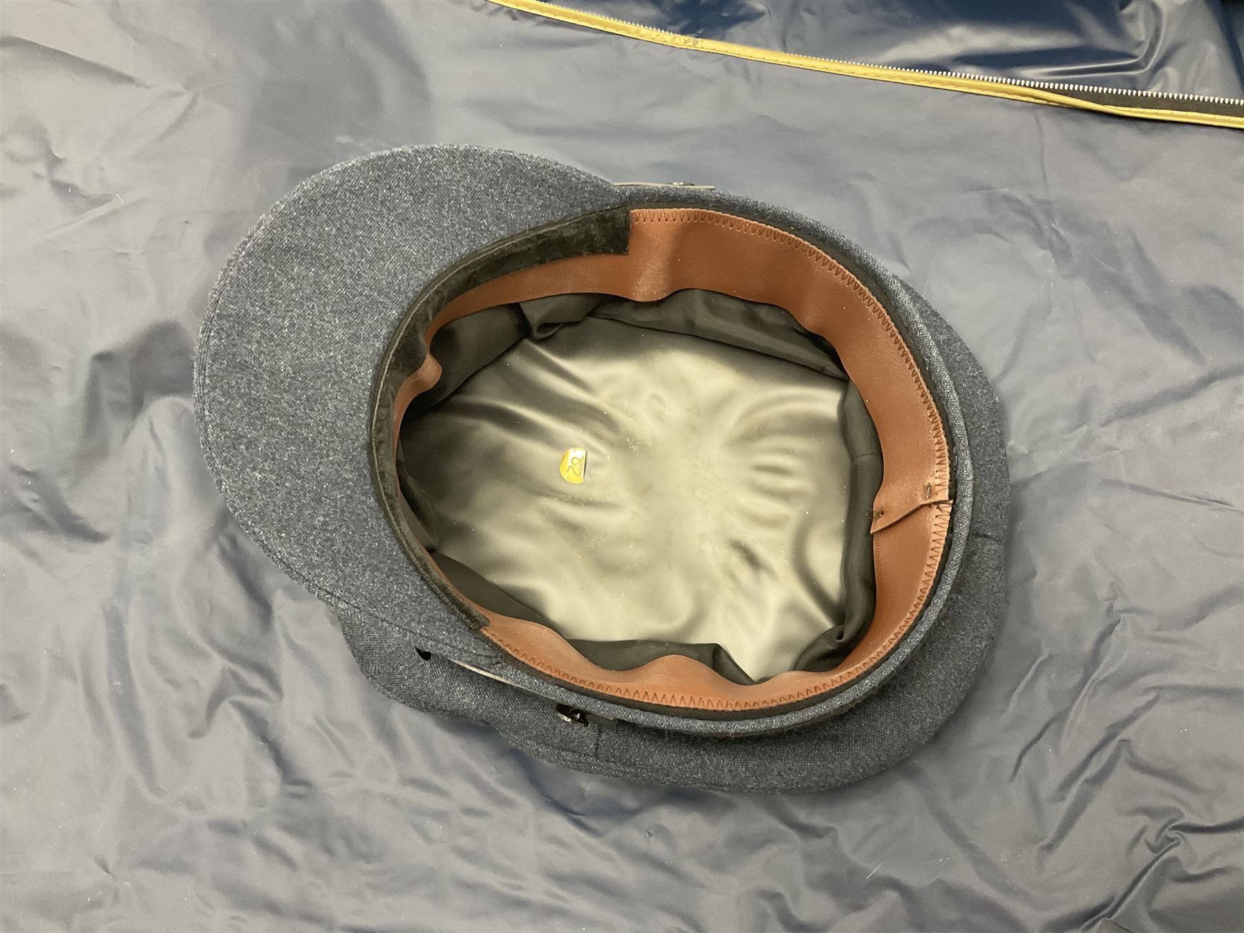 RAF Flight Lieutenant's uniform with peaked cap and WW2 ribbon bar; WW2 gas mask in blue canvas bag dated 1942; flying helmet date 1984; and British Army Major's uniform with Staybrite buttons and peaked cap