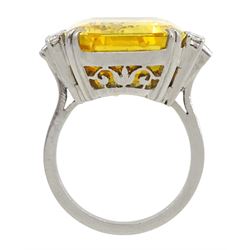 Palladium natural yellow sapphire ring, set with three baguette and round cut diamonds either side, sapphire approx 28.00 carat, with The Gem & Pearl Laboratory report stating no evidence of heat treatment, origin opinion Sri Lanka, colour transparent yellow