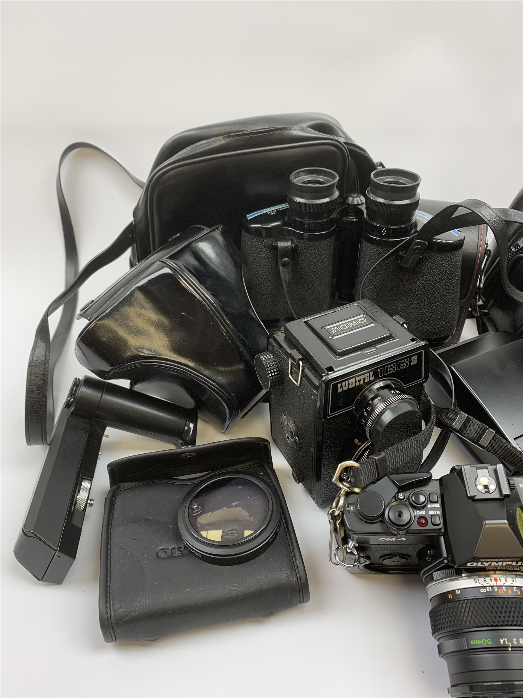 Vintage cameras lenses and accessories including Olympus 'OM10' camera body, Olympus 'OM4' camera, 'Olympus OM-System Zuiko auto-zoom 35-70mm 1:4' lens, various other lenses, tasco binoculars etc, in one box