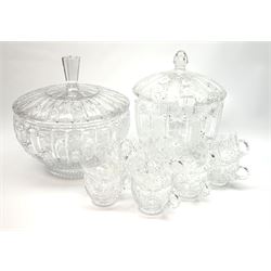 Two large cut glass punch bowls with covers, together with ten punch cups with decoration confirming to the taller bowl, tallest bowl including cover H8cm, same example D23cm. 