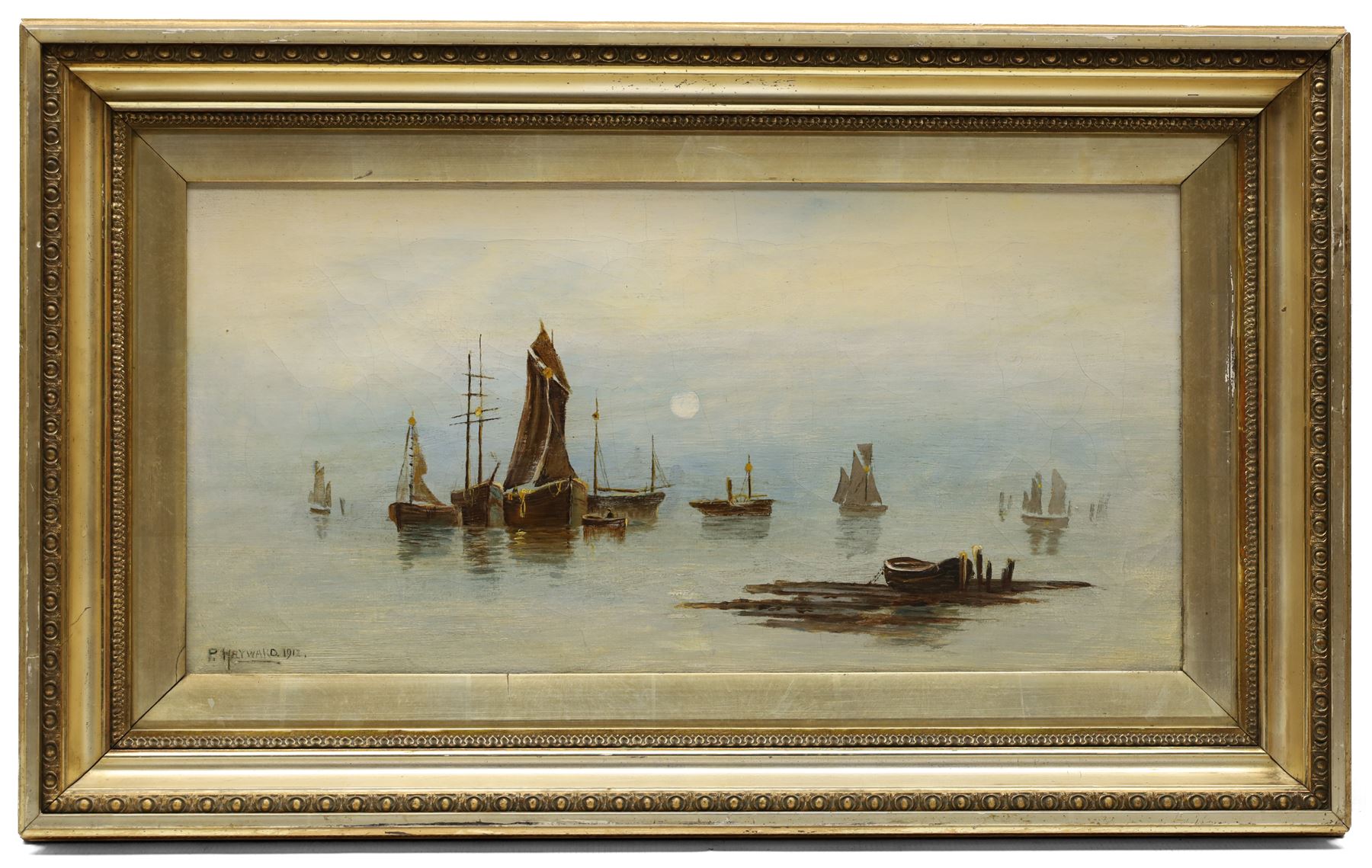 P Hayward (British 19th/20th century): Sailboats on Calm Seas, oil on canvas signed and dated 1912, 24.5cm x 50cm