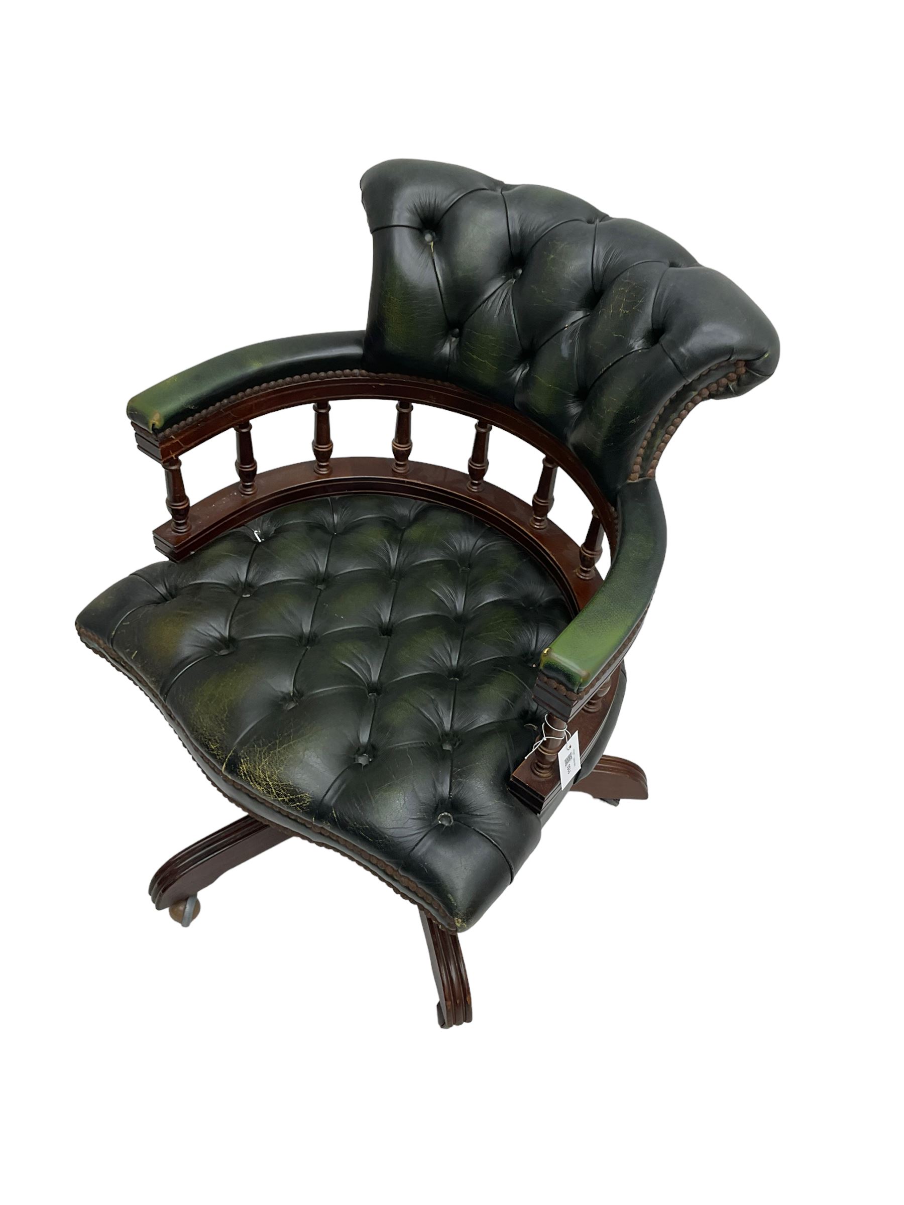 Captains swivel desk chair, upholstered in buttoned leather