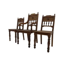 Victorian Gothic revival pitch pine armchair and pair of matching chairs