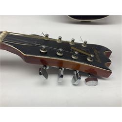 Eastern eight-string mandolin with sunburst finish and mother-of-pearl inlay L68.5cm; and another Harmony mandolin with cracked headstock (2)