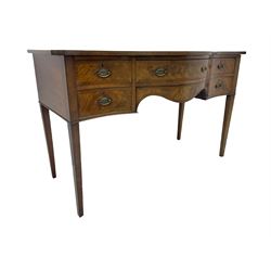 George III mahogany serpentine sideboard, fitted with four drawers, on tapering supports