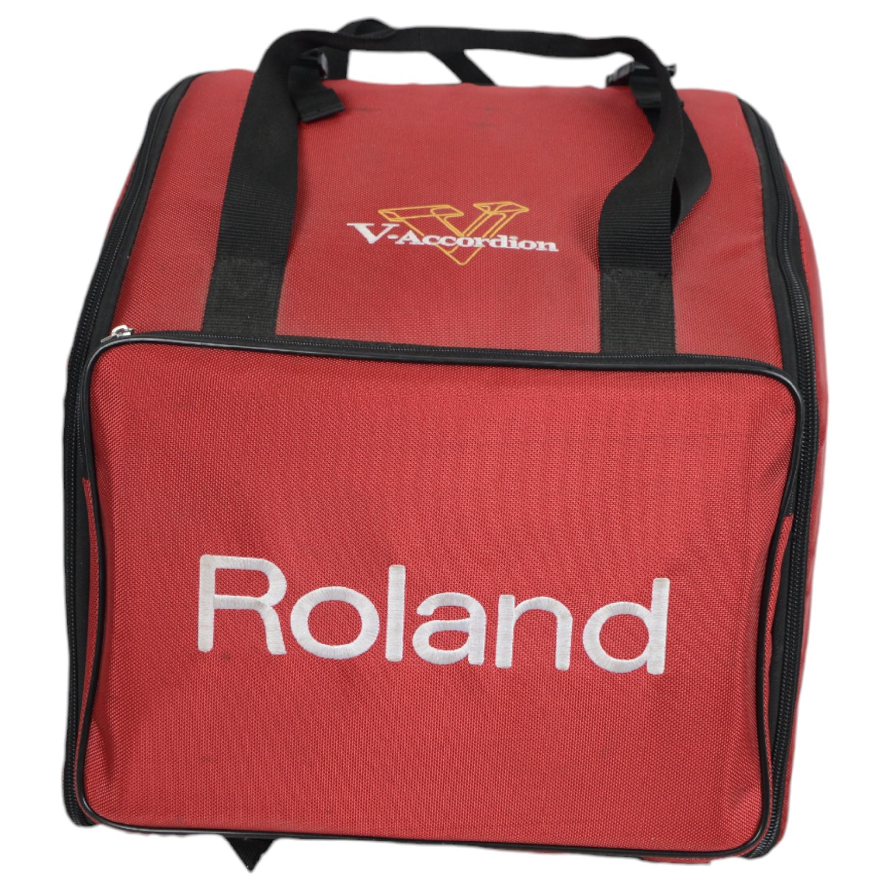Rolan FR-1X  V-accordion, 13 fold bellows, 62 butttons, classic, jazz, ensemble, brass, wind, piano and guitar, samples. With leads and carrying case.