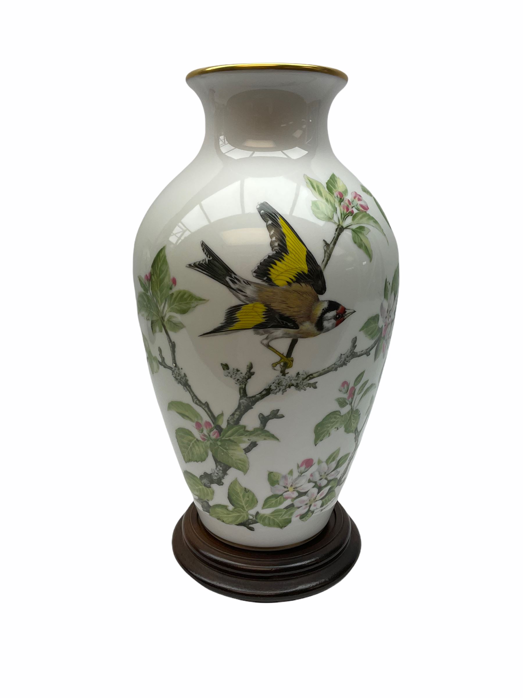 Pair of Franklin Porcelain ovoid vases, The Meadowland Bird Vase and The Woodland Bird Vase by Basile Ede H30cm, with wooden stands and certificates.
