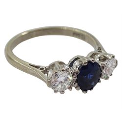 White gold three stone oval sapphire and round brilliant cut diamond ring, stamped 18ct, sapphire approx 0.60 carat, total diamond weight approx 0.60 carat 