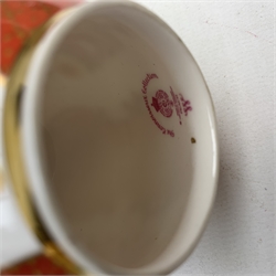 Three boxed Royal Worcester candle snuffers from The Connoisseur Collection, each modelled as a fruit with gilded stem, comprising pineapple, apple and pear, each with printed mark to interior, tallest H11cm. 