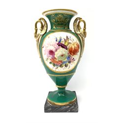 A 19th century twin handled vase, the baluster body with twin swan modelled handles, painted with a central panel of flowers, upon a green ground, H21.5cm.