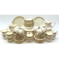 Paragon Belinda dinner service comprising of sixteen plates, twenty two side plates, sixteen tea plates, sixteen cups and fifteen saucers, ten breakfast bowls, eight dessert bowls, two cake plates, salt and pepper pots, gravy boat and saucer, milk jug, two sugar bowls and a teapot 