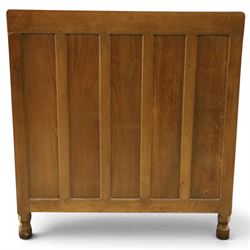 Mouseman - early-to-mid 20th century adzed and panelled oak chest, raised back over rectangular adzed top with canted corners, fitted with two short over three long drawers with turned knob handles, raised on octagonal feet, with carved mouse signature, by the workshop of Robert Thompson of Kilburn