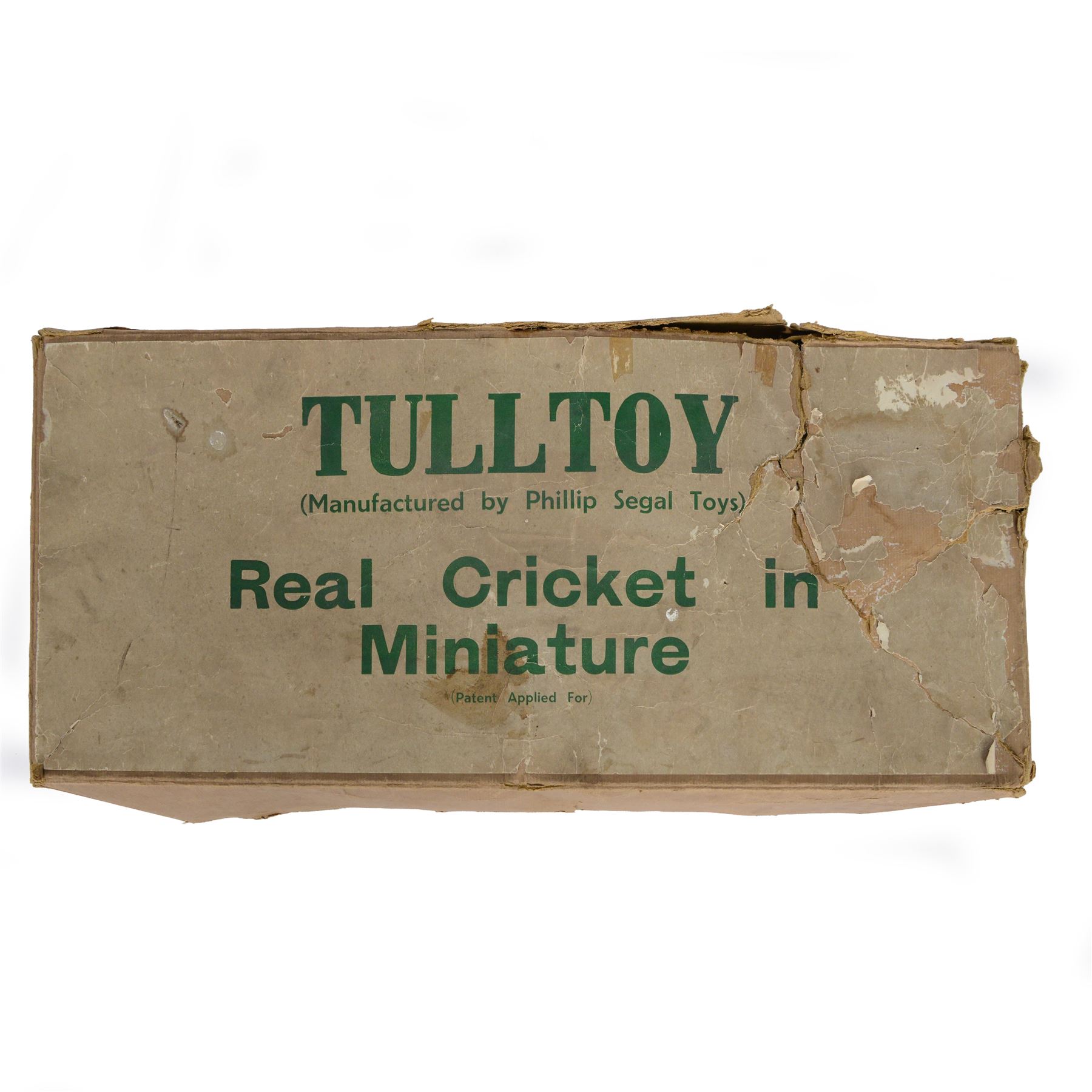 1940s Tulltoy by Phillip Segal Toys 'Real Cricket in Miniature' circa 1947, includes thirteen lead cricketers, six with red hats and seven with blue, two umpires, two sets of wickets, one metal ball, felt cricket pitch with white stitching and metal batting and bowling fixtures, contained within original box