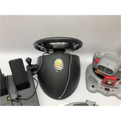 Mad Catz Dual Force Racing Wheel and Foot control for Playstation; Arcadia Image Projecting Game System; pair of Captain Scarlet and the Misterons phaser guns etc