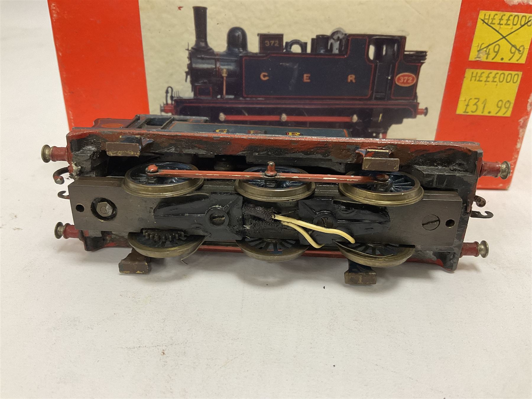 ‘00’ gauge - three steam locomotives and comprising two kit built examples; J69 Class 0-6-0T no.68619 in BR dark blue; J69 Class 0-6-0T no.68626 in BR black; with Wills Finecast boxes; one further similar example Class J67 ‘Buckjumper’ 0-6-0 no.372 being comprised of a singular heavy metal body and chassis; all models with Wills Finecast boxes (3) 