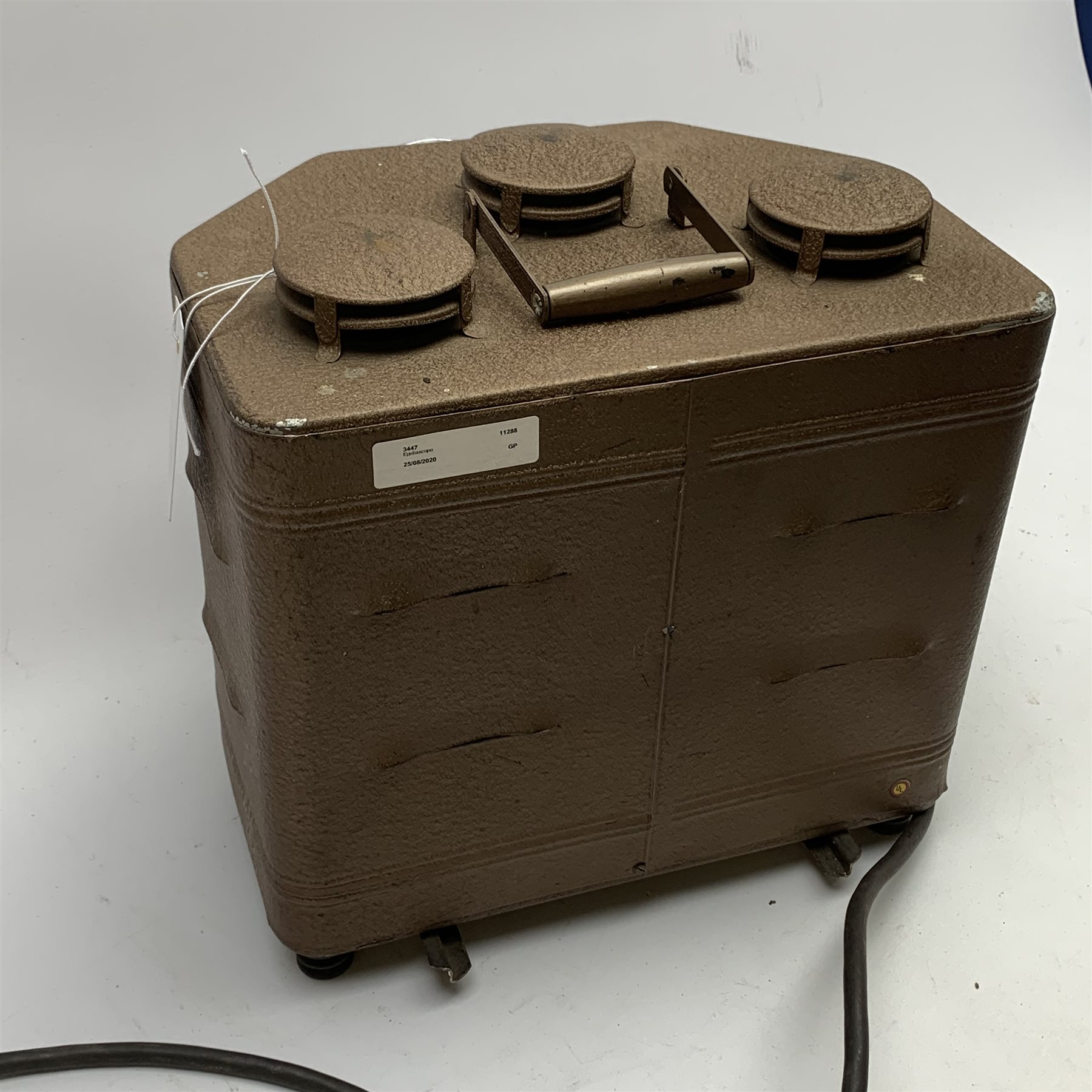 Keystone Pictograph Model No.441 Epidiascope, the trapezium shaped tin case with brown crackled finish, W30cm H28cm