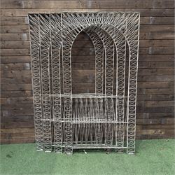Four early 20th century French painted wicker garden trellis or dividers, rectangular form with internal arches