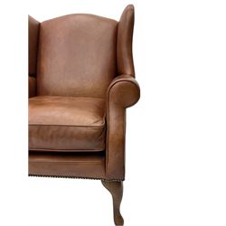 Laura Ashley - wingback armchair, upholstered in brown leather, on cabriole front feet