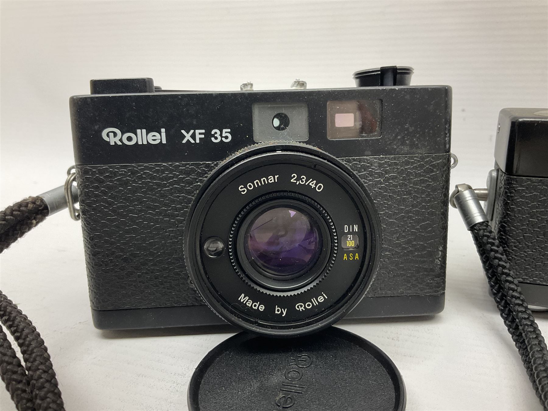Three Rollei cameras, to include a Rollei 35 LED camera, with Triotar 3.5/40 lens and two Rollei XF 35 cameras, each with Sonnar 2.3/40 lenses