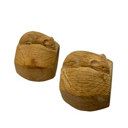 'Mouseman' four oak napkin rings, of bulbous octagonal form each carved with mouse signature, by Robert Mouseman Thompson of Kilburn 