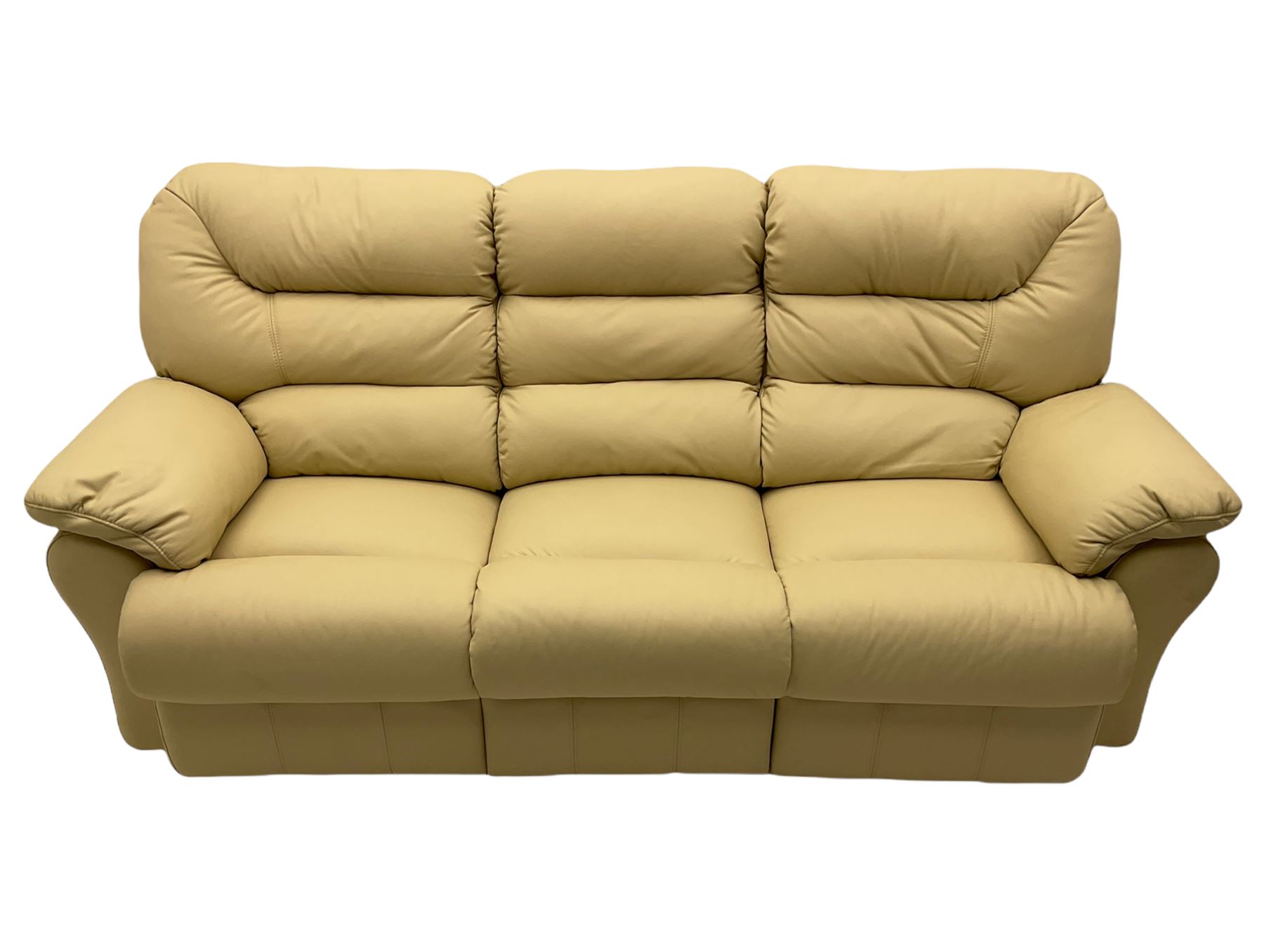 Three seat sofa upholstered in cream leather with end recliners The