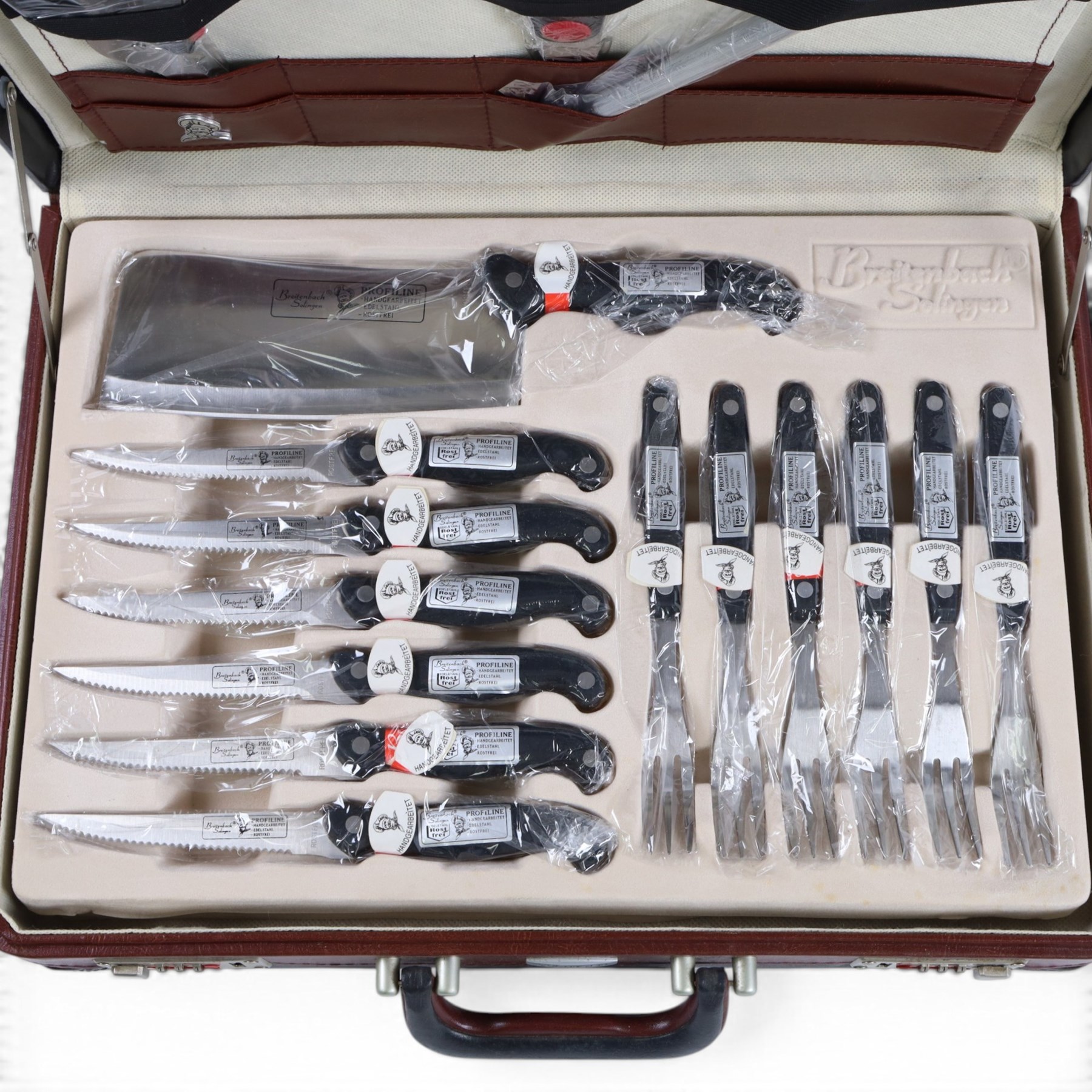 Cased Solingen steak cutlery and kitchen knife set