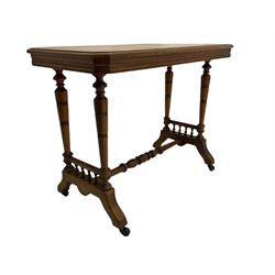 Late Victorian oak side table, moulded top, bobbin turned supports and stretcher, shaped feet and castors