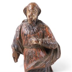 17th century, continental figure of saint, with painted polychrome detail, the figure adorned in robes, with hand on chest, upon a later wooden plinth, H31cm