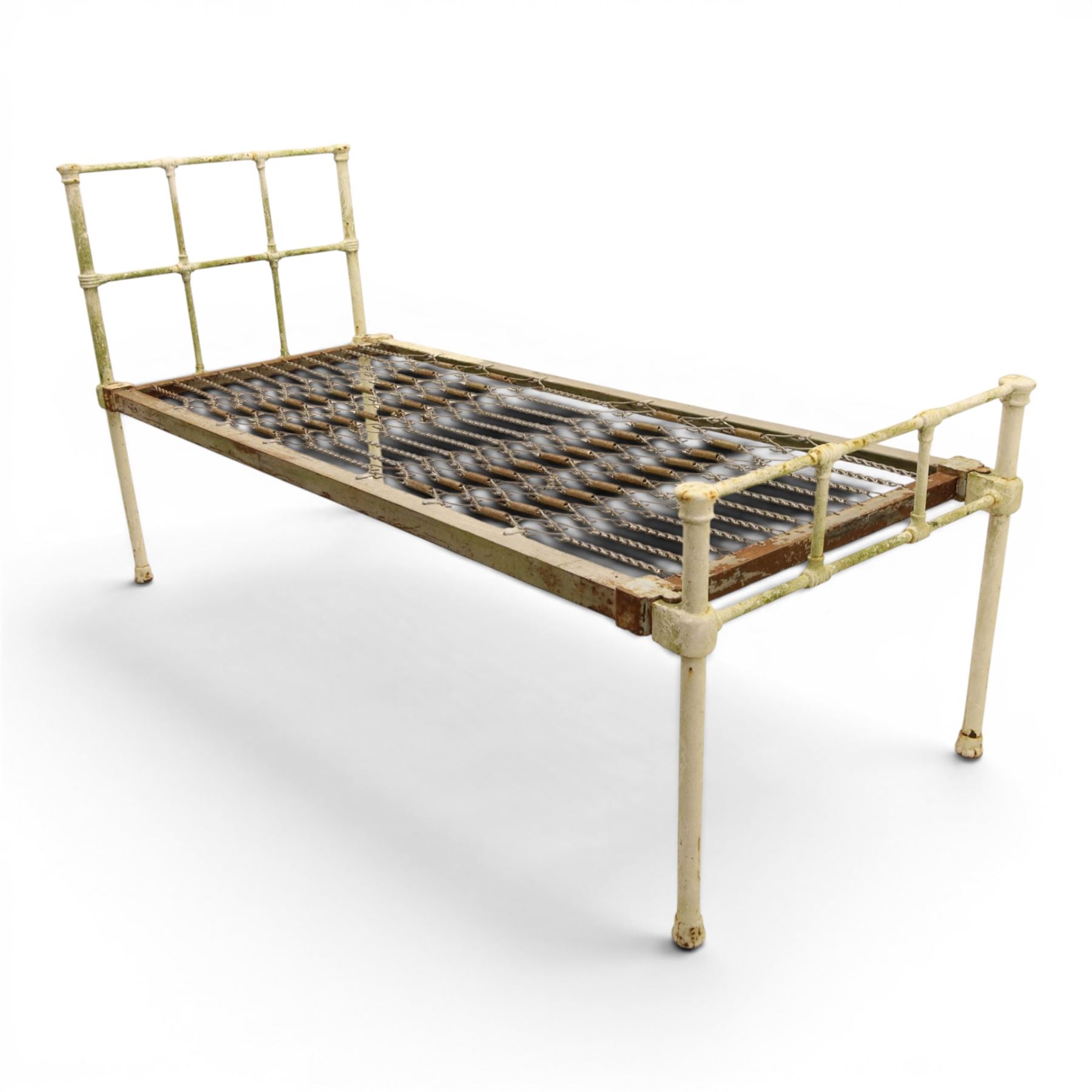 19th century wrought iron single bed, white frame with knot details, frame with wire and spring supports