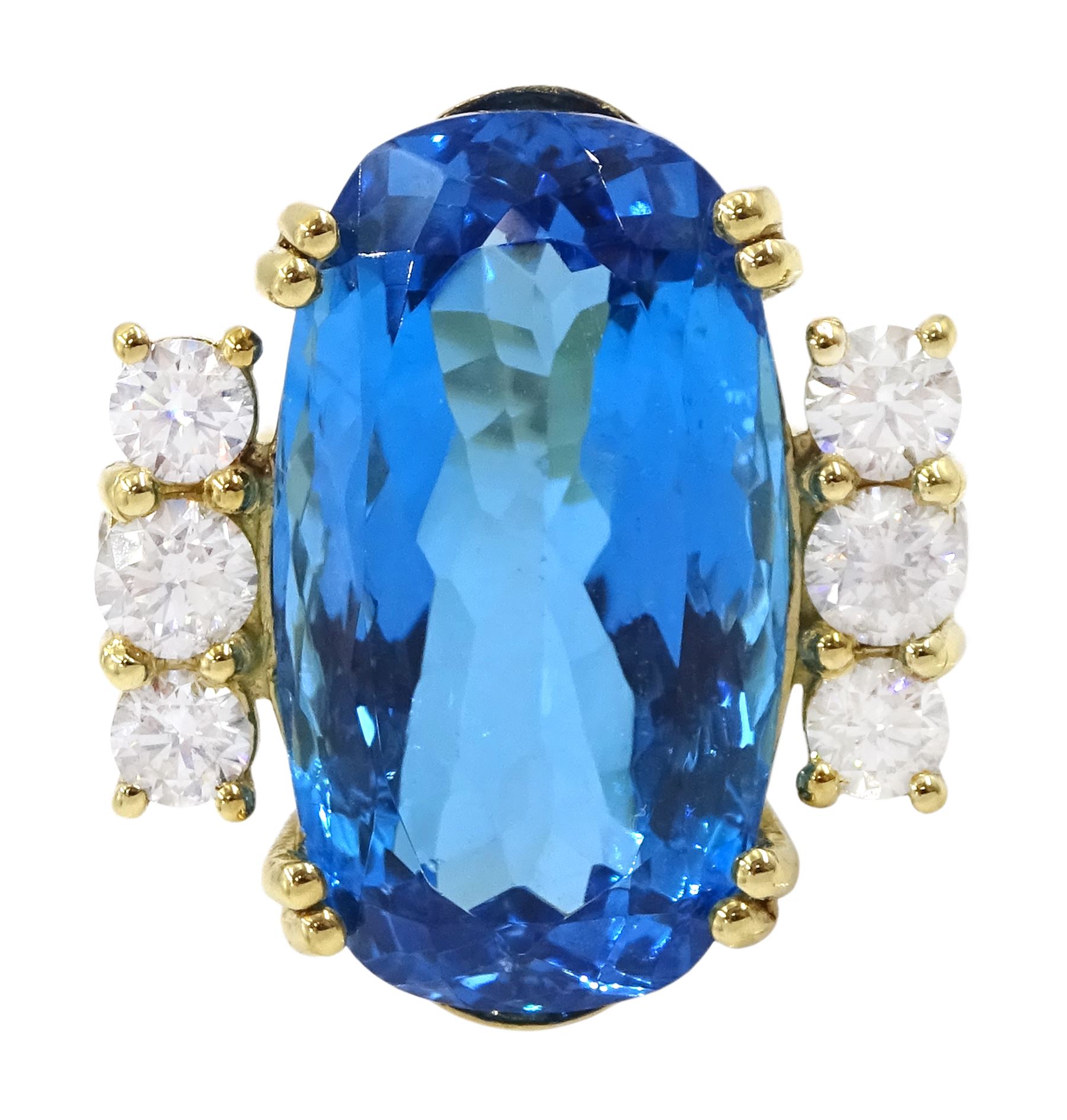 18ct gold blue topaz and diamond ring, single oval cut blue topaz of approx 31.10 carat, with four round brilliant cut diamonds set either side and a further two diamond set to the gallery, London 2019, total diamond weight approx 2.25 carat