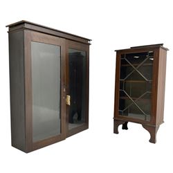 Edwardian inlaid mahogany cabinet, single astragal glazed door enclosing three shelves (W60cm D34cm H122cm); Early 20th century oak enclosed bookcase, fitted with two glazed doors (W108 D33 H130)