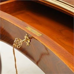 Baggio Anciens Meubles - Italian Louis XV style kingwood and gilt metal mounted bureau plat or writing desk, the shaped rectangular top with inset leather writing surface with gilt metal edge, above three shaped frieze drawers with gilt metal handles, raised on cabriole supports with gilt cartouche mounts to the knees and scroll feet
