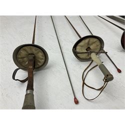 20th century Indian Tulwar sword with 71cm plain curving steel blade and iron hilt with extended langets, knopped grip and spiked pommel; in canvas covered wooden scabbard L87.5cm overall; together with five fencing swords comprising four foils and one epee, three marked Leon Paul, one in carrying case (6)