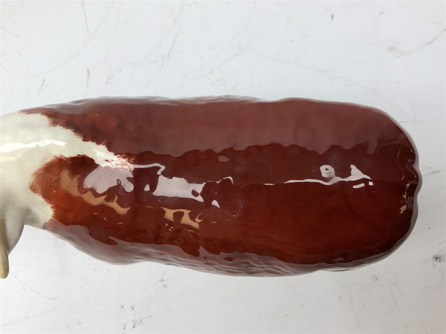 Three Beswick models comprising Hereford Bull no 949, 'CH Cutmil Cupie' Pug, and bay Shire horse, all with printed marks beneath