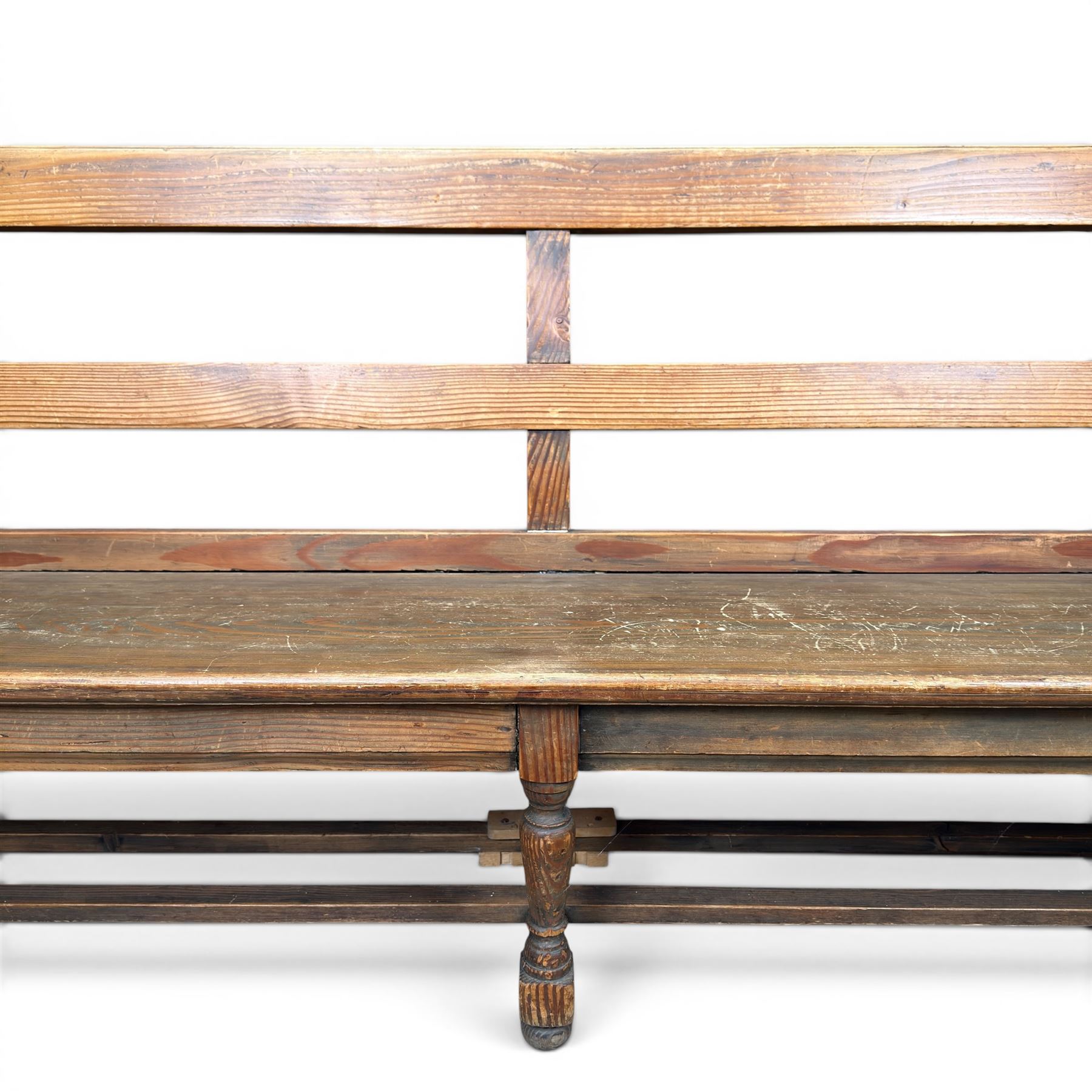 Early 20th century pine and oak bench seat, stained pine rail back frame with shaped oak arms