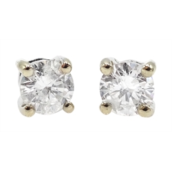  Pair of 18ct white gold diamond stud earrings, 750, diamonds total weight 0.36 carat  